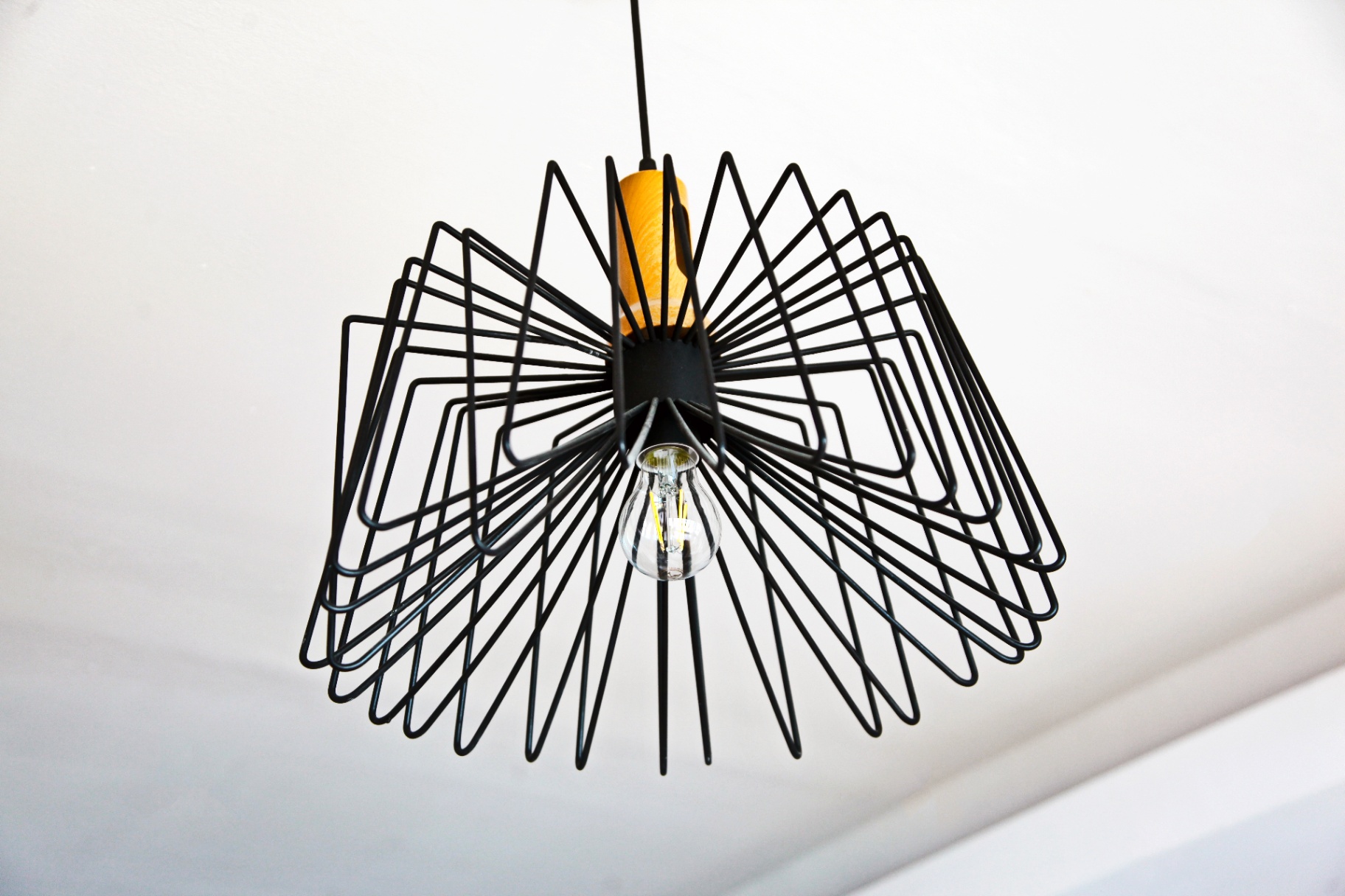 Sculptural black pendant light detail